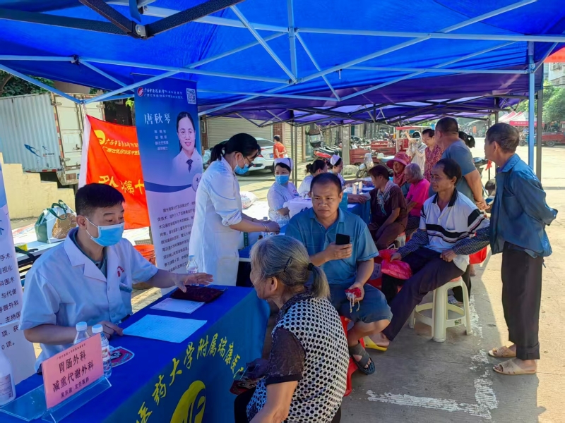 高温无阻送仁心，中医义诊进基层——我院联合坛洛镇政府开展“中医药文化进基层”义诊活动